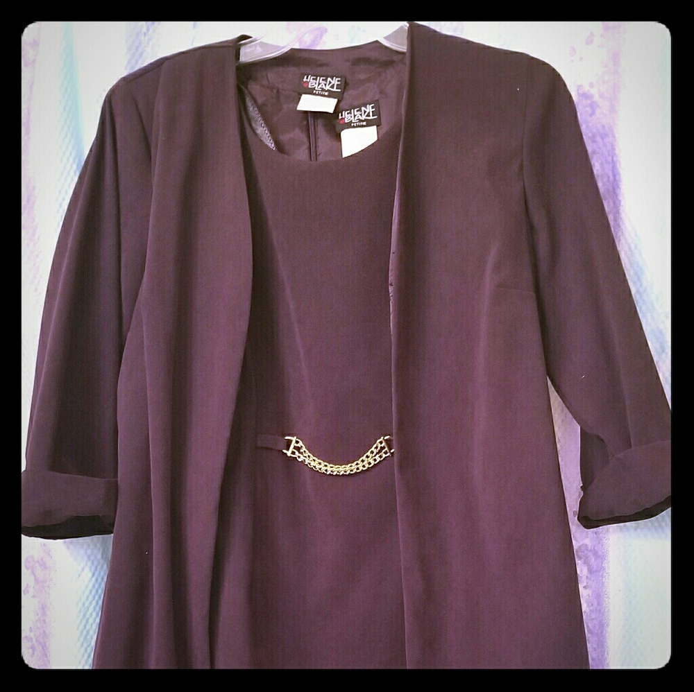 Two piece dress set with a chain in the middle.